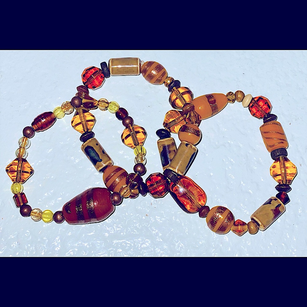 Set of 3 Women’s Orange, Gold and Brown Glass and Stone Beaded Bracelets.